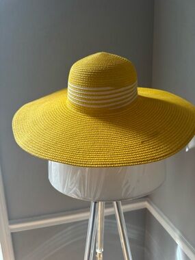 Beautiful yellow and white straw hat.